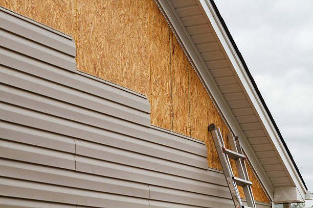 Professional Siding Contractor technician working in West Newton, PA
